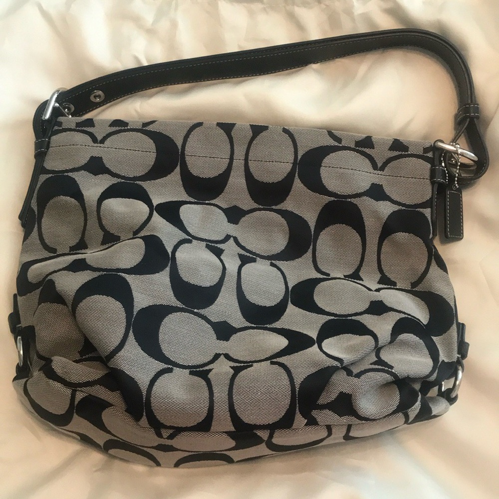 Coach purse with black and off black coloring
